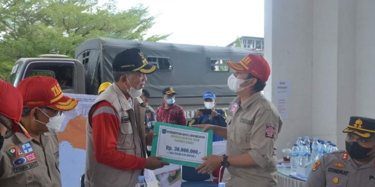 Pemko Sawahlunto Serahkan Bantuan Korban Bencana Gempa