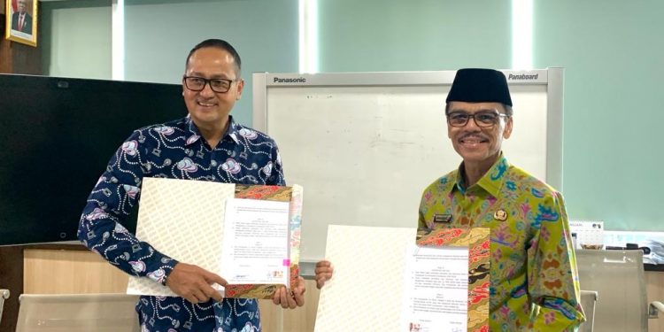 Bupati Safaruddin Lakukan MoU Smart City Limapuluhkota Dikawal Kemkominfo