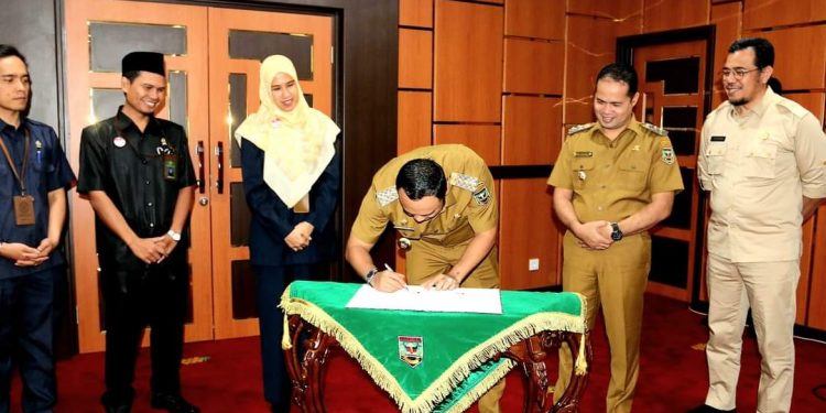 Pemkab Sijunjung Lakukan Penandatanganan Nota Kesepakatan dengan Pengadilan Agama Percepatan Layanan Hukum